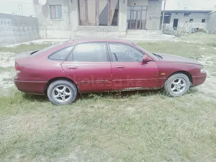 Mazda 626 1992 года за 550 000 тг. в Шымкент – фото 4