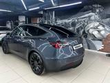 Tesla Model Y 2021 года за 17 100 000 тг. в Алматы – фото 2
