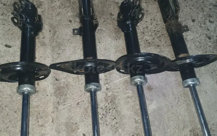 Тойота камри 40 передний и задний стойка за 100 000 тг. в Астана