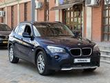 BMW X1 2011 года за 3 800 000 тг. в Жанаозен – фото 3