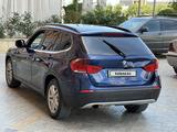BMW X1 2011 года за 3 800 000 тг. в Жанаозен – фото 5