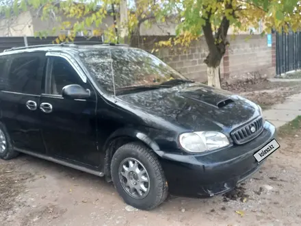 Kia Carnival 1999 года за 1 300 000 тг. в Ленгер