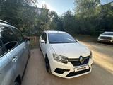 Renault Logan 2018 года за 3 200 000 тг. в Уральск – фото 2