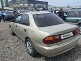 Mazda 323 1995 года за 1 600 000 тг. в Талдыкорган – фото 4