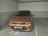 Kia Rio 2019 года за 6 950 000 тг. в Астана