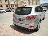 Hyundai Santa Fe 2011 года за 8 155 000 тг. в Актау – фото 2