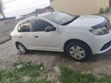 Renault Logan 2014 года за 2 500 000 тг. в Усть-Каменогорск – фото 2