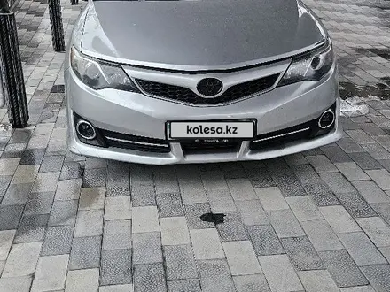 Toyota Camry 2015 года за 8 700 000 тг. в Шымкент
