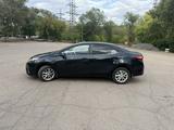 Toyota Corolla 2015 года за 6 300 000 тг. в Караганда – фото 4