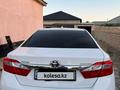 Toyota Camry 2013 года за 8 500 000 тг. в Жанаозен – фото 15