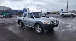 Nissan NP300 2009 года за 3 400 000 тг. в Караганда