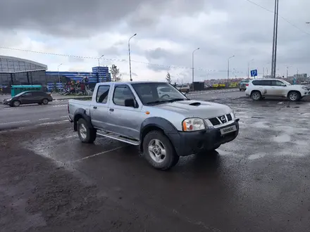 Nissan NP300 2009 года за 3 400 000 тг. в Караганда