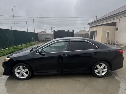 Toyota Camry 2014 года за 7 800 000 тг. в Кызылорда – фото 2