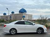 Toyota Camry 2013 года за 9 600 000 тг. в Жанаозен – фото 2