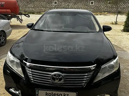 Toyota Camry 2014 года за 9 000 000 тг. в Жанаозен