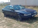 Mazda 626 1991 года за 559 812 тг. в Актобе – фото 2