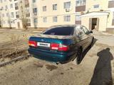 Toyota Carina E 1997 года за 2 200 000 тг. в Актобе – фото 4