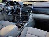 Toyota Camry 2015 года за 6 500 000 тг. в Актобе – фото 4