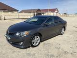 Toyota Camry 2012 года за 7 500 000 тг. в Жанаозен – фото 2