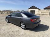 Toyota Camry 2012 года за 7 500 000 тг. в Жанаозен – фото 4