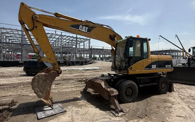 Caterpillar  318 2006 года за 24 500 000 тг. в Алматы