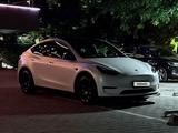 Tesla Model Y 2023 года за 21 000 000 тг. в Алматы