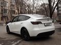 Tesla Model Y 2023 года за 21 000 000 тг. в Алматы – фото 26