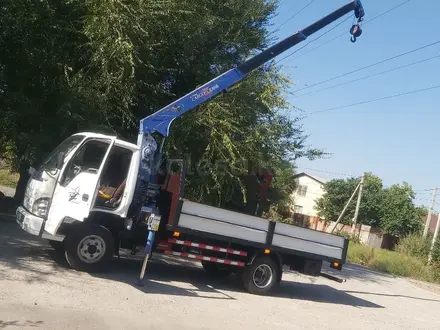 Isuzu  Elf (N-series) 2012 года за 8 800 000 тг. в Алматы – фото 2