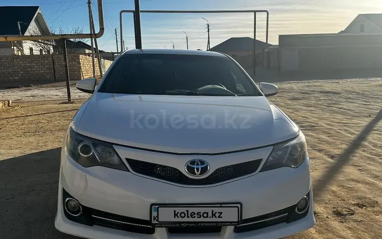 Toyota Camry 2013 годаfor8 800 000 тг. в Жанаозен