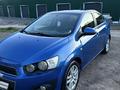 Chevrolet Aveo 2013 года за 2 980 000 тг. в Караганда – фото 2