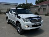 Toyota Hilux 2013 года за 12 350 000 тг. в Жанаозен