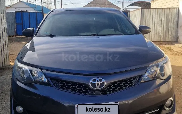 Toyota Camry 2013 года за 5 600 000 тг. в Актобе