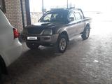 Mitsubishi L200 2004 годаүшін3 700 000 тг. в Жанаозен