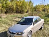 Mazda 323 2003 годаүшін2 200 000 тг. в Атбасар – фото 2