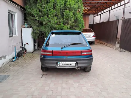 Mazda 323 1994 года за 900 000 тг. в Алматы – фото 2