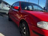 Mazda 323 1998 года за 1 950 000 тг. в Алматы – фото 4