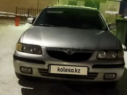 Mazda 626 1999 года за 2 100 000 тг. в Актобе – фото 3