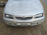 Mazda 626 1997 года за 1 800 000 тг. в Актау – фото 2