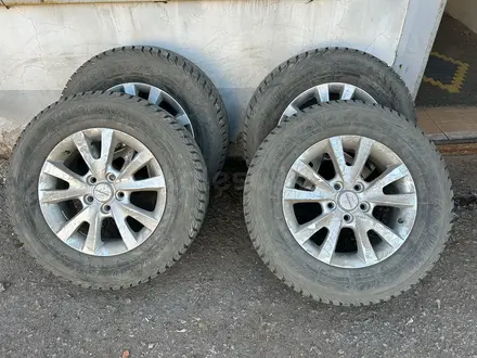 Диски с зимней резиной 215/70 R16 за 180 000 тг. в Астана – фото 2