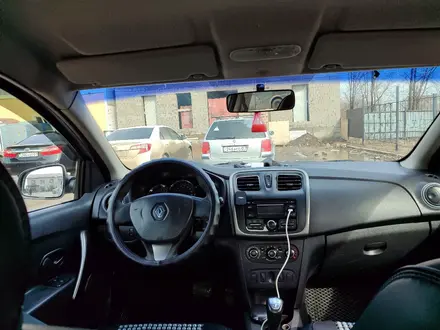 Renault Logan 2015 года за 2 700 000 тг. в Уральск – фото 6