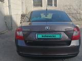 Skoda Rapid 2014 года за 5 300 000 тг. в Караганда – фото 2