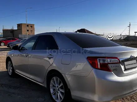 Toyota Camry 2012 года за 5 300 000 тг. в Жанаозен – фото 2