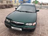 Mazda 626 1998 года за 1 950 000 тг. в Астана – фото 2