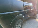Nissan NP300 2013 года за 3 900 000 тг. в Шымкент – фото 4