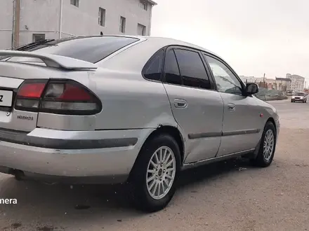 Mazda 626 1998 года за 1 200 000 тг. в Актау – фото 5