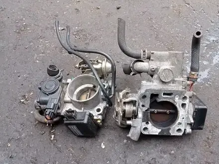 ДРОССЕЛЬНАЯ ЗАСЛОНКА MAZDA за 27 600 тг. в Алматы – фото 2