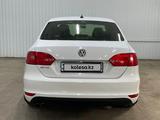 Volkswagen Jetta 2013 года за 3 489 000 тг. в Астана – фото 4