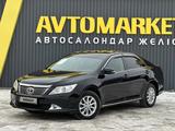 Toyota Camry 2013 года за 9 100 000 тг. в Актобе