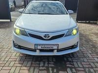 Toyota Camry 2012 года за 8 800 000 тг. в Атырау