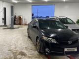 Toyota Camry 2013 года за 8 600 000 тг. в Атырау